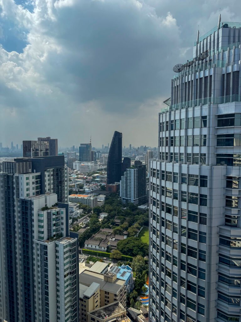 skyscrapers towering over the city center metropolis with big windows
